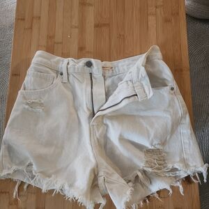 Levi's Cream Distressed Denim Shorts